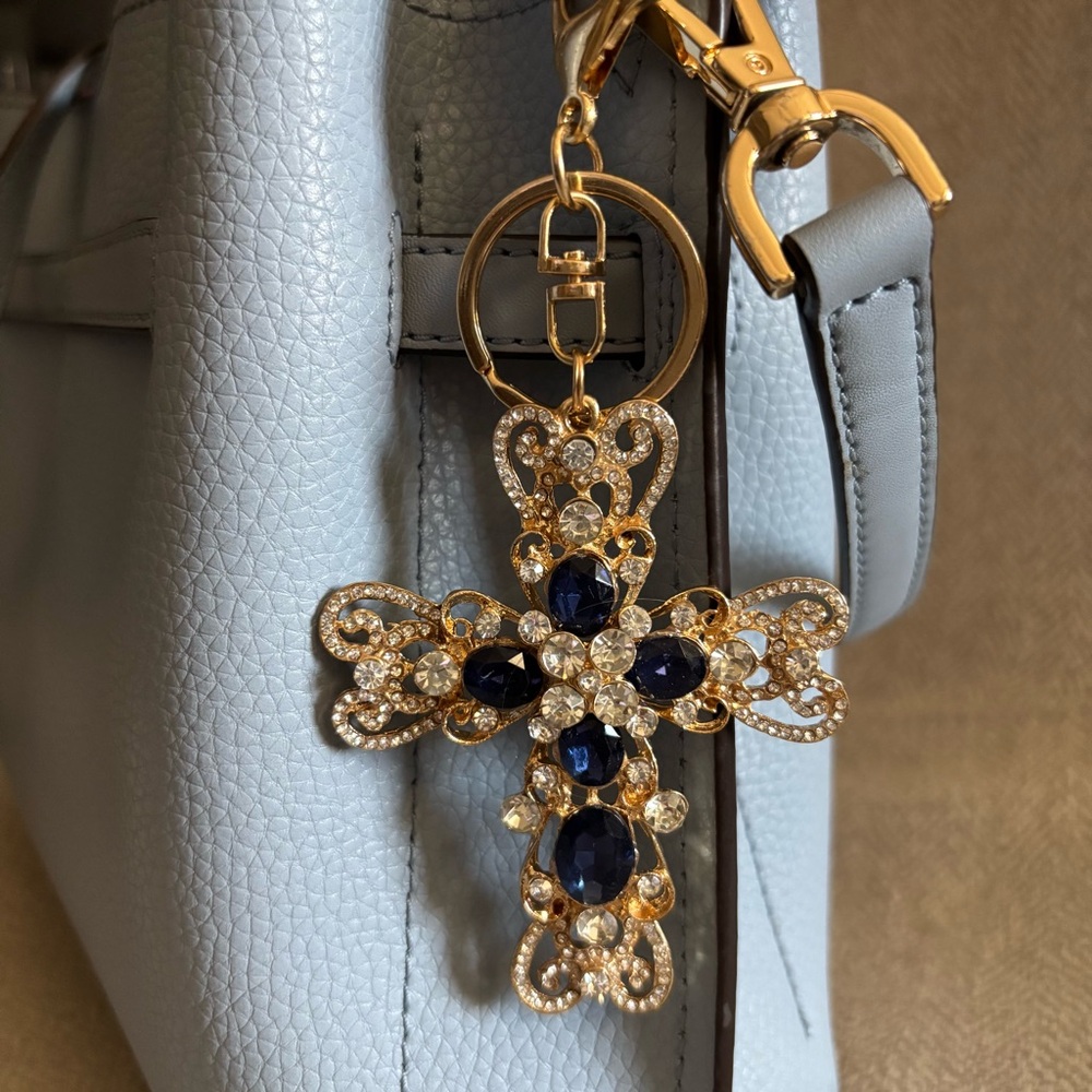 Elegant Blue and Gold Cross Charm